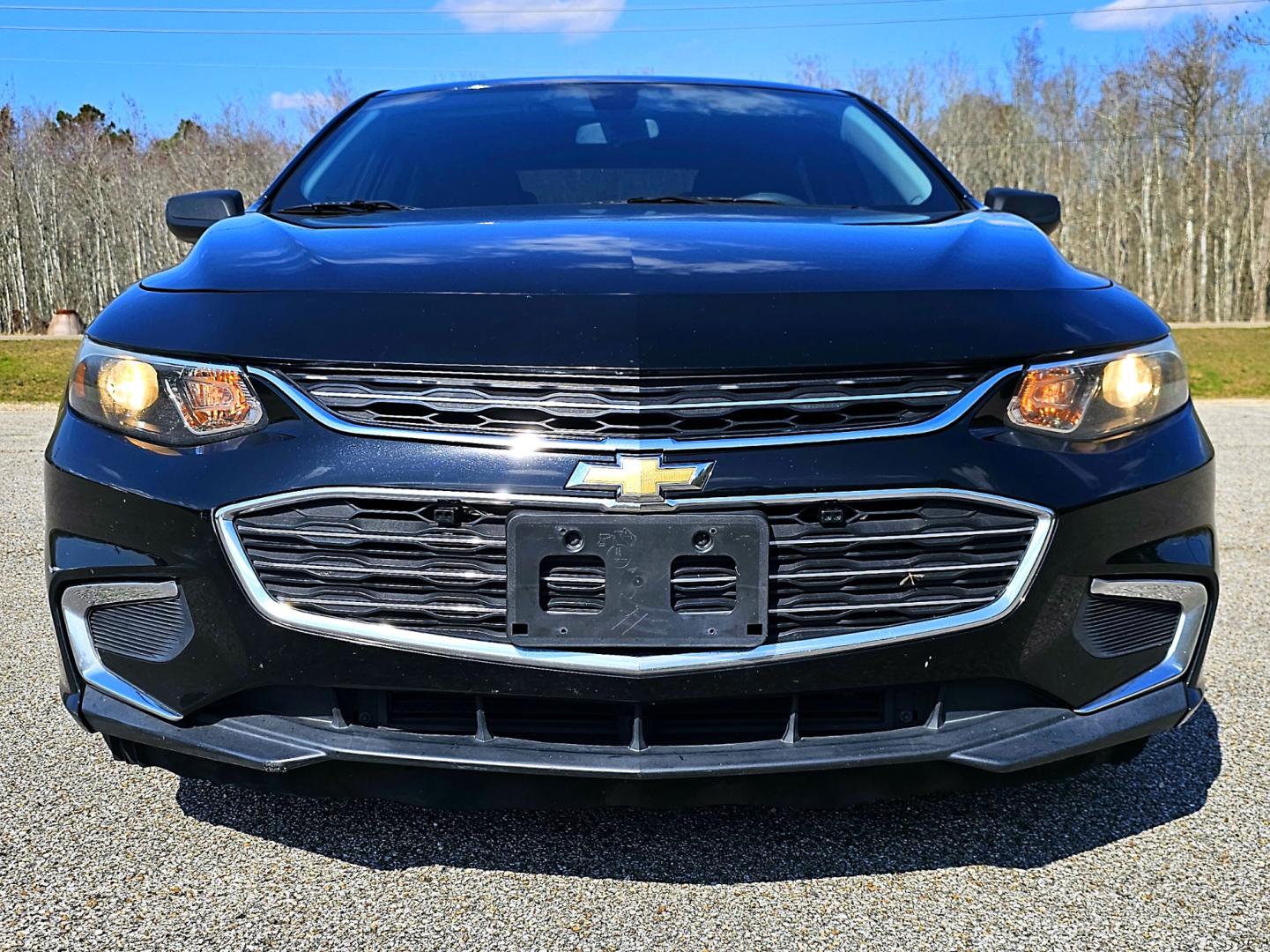 2016 Black Chevrolet Malibu LS (1G1ZB5ST4GF) with an 1.5L L4 DOHC 16V engine, 6A transmission, located at 18001 Kellogg Rd, Saucier, MS, 39574, (228) 832-1441, 139.421463, -76.641457 - Photo#1